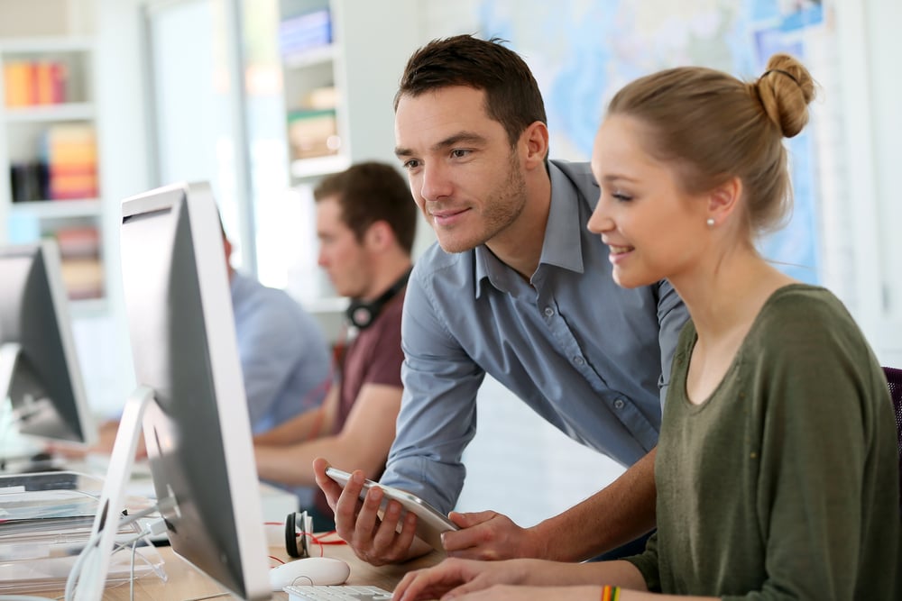 Student girl with trainer working on computer and tablet-1